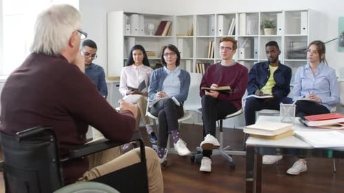 Multiethnic Students Listening to University Professor