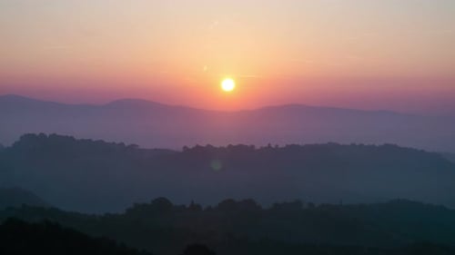 Majestic Sunrise Over Misty Mountains