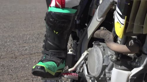 Dirt Bike Rider Shifting Gears Close Up