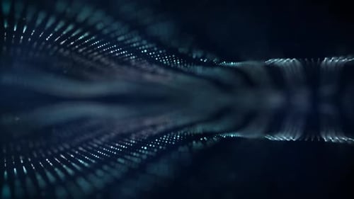Las partículas azules brillantes se mueven suavemente sobre un fondo azul