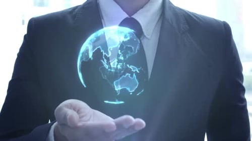 Man Holds Futuristic Globe Hologram in Hand