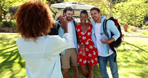 Friends Pose For Photo During Road Trip