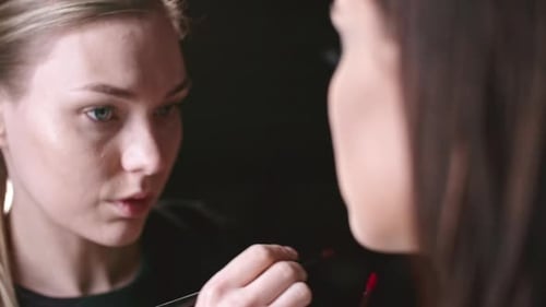 Putting On Lipstick