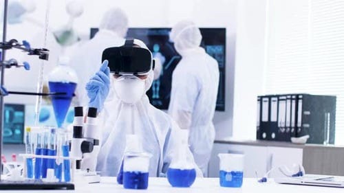 Scientist Using Virtual Reality in Advanced Laboratory