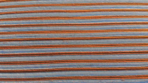 Furrows row pattern in a plowed field
