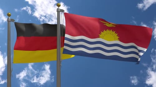 Realistic Waving Flags of Germany and Kiribati in Blue Sky