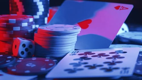 Casino Chips and Playing Cards in Motion
