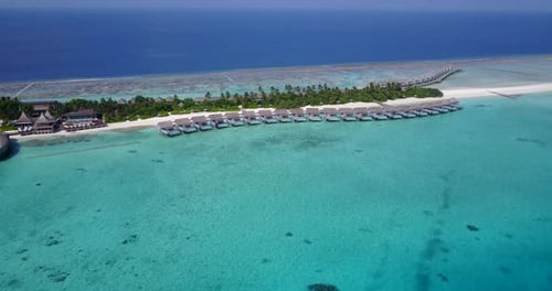 Daytime above clean view of a summer white paradise sand beach and aqua turquoise water background