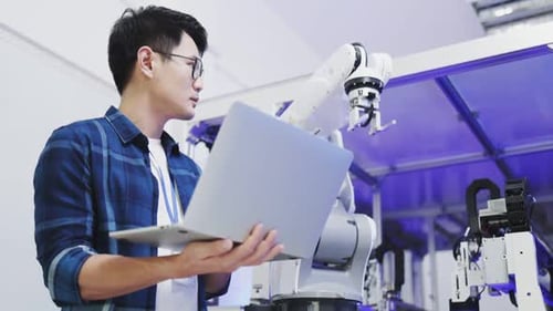 Engineers Maintenance Robot Arm at Lab.