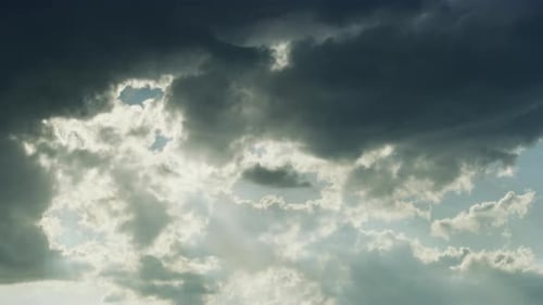 Dark Grey Clouds Pass to Make Way for the Glorious Sunshine