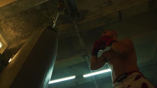 Boxer Training Hard, Punching a Heavy Bag