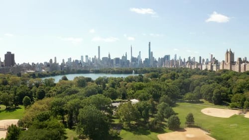 Beautiful Central Park View and Manhattan Skyline in Background at Sunny Summer Day