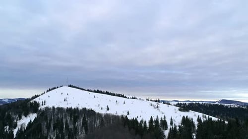 Aerial View in Foggy Sunset Winter Mountain