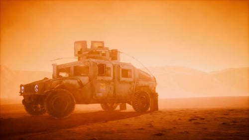 Military Patrol Car on Sunset in Desert Storm