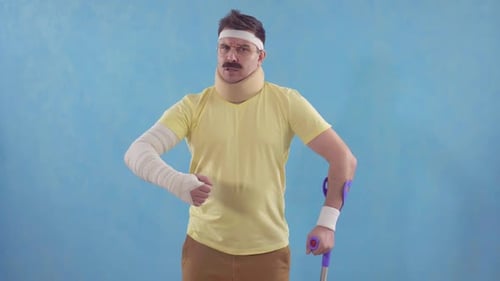 Injured Man With Cast and Neck Brace