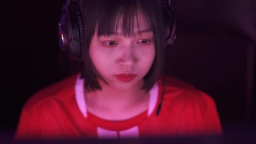 Woman Gamer Looking at Computer Screen