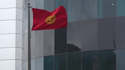 Realistic Kyrgyzstan Flag Waving on Modern Building Flagpole