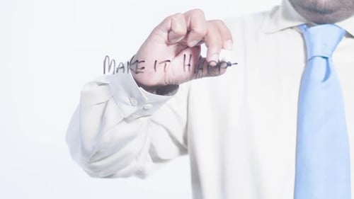 Asian Businessman Writes Make It Happen