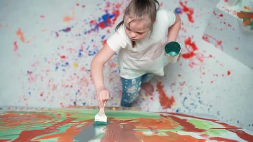 Girl Painting Abstract Art on Large Canvas