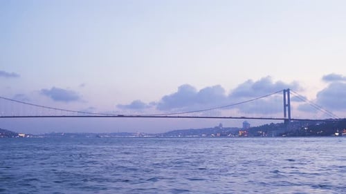 Bridge and city at night.