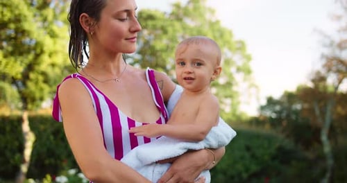 Mother and Child Moment Outdoors in the Sunlight