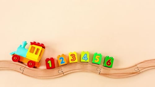 Toy Train Pulls Number Blocks on Wooden Track