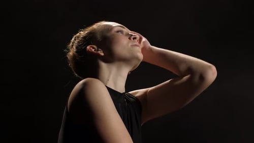 Woman with Blonde Hair Posing in Studio
