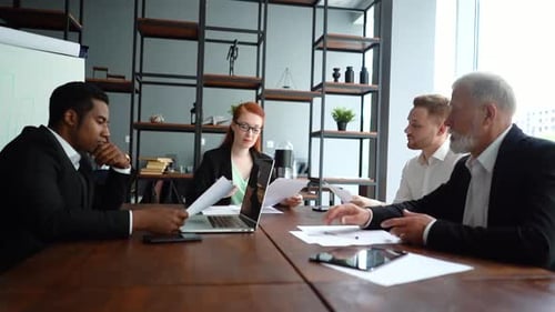 Business Team of Multi-ethnic of Professional Businesspeople Discussing Project Working Together.