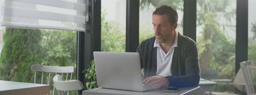Man using laptop computer for work