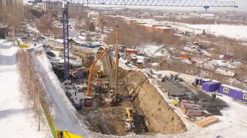 Large Construction Site with Busy Cranes