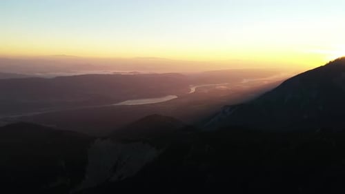 Majestic Mountain Range at Stunning Sunrise, Aerial View