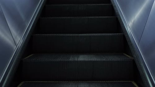 Escalator Steps Moving Upward in City