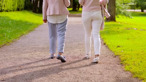 Senior Women or Friends Drinking Coffee at Park