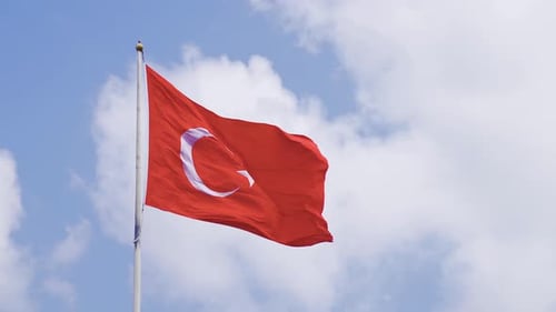 Flag Waving Against a Blue Sky