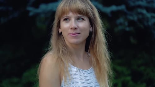 Portrait of a Young Beautiful Girl in the Park.