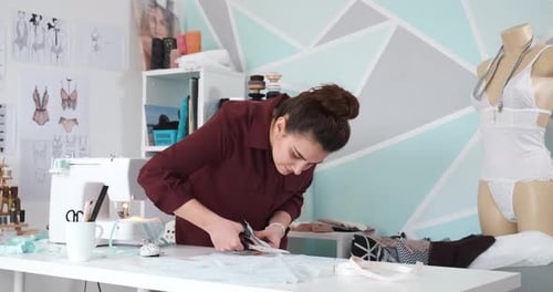 Clothes Fashion Designer Working in Her Sewing Studio Atelier
