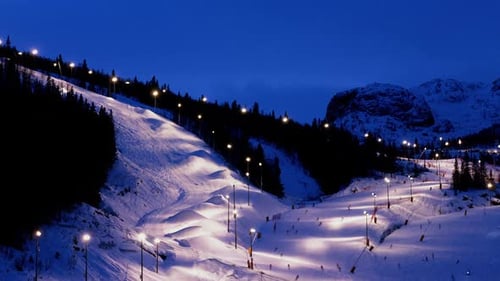 Night Skiing at a Lit Mountain Resort