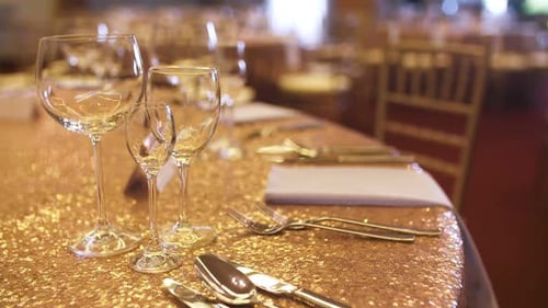 Sparkling Gold Table Setting Ready for Celebration