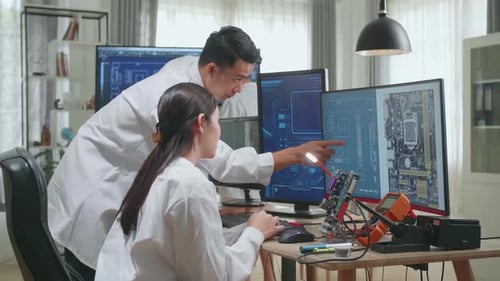Development Facility: Asian Team Of Multi Engineers, Scientists Work On Computer, Talk, Design Pcb