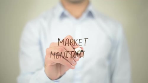 Market Monitoring, Businessman Writing on Transparent Screen