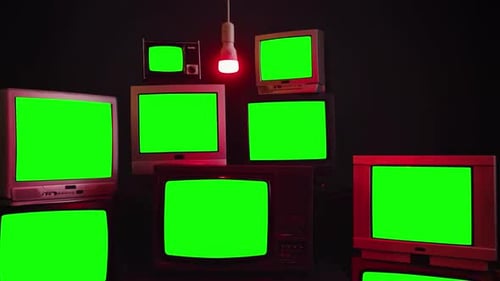 Stack of Retro Vintage TV Turning On Green Screens