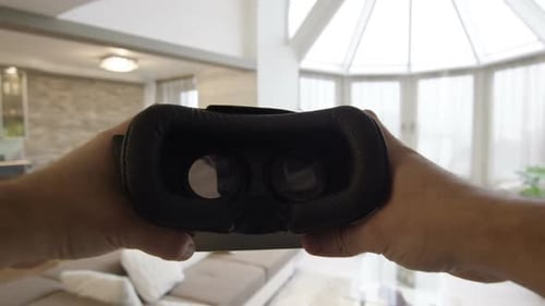 Holding a VR Headset, Modern Home Interior