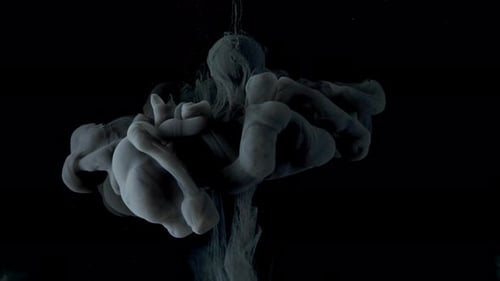 Black Ink Paint Smoke Slowly Flows From the Ball