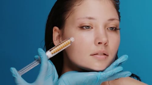 Cosmetic Injection on Young Woman's Face