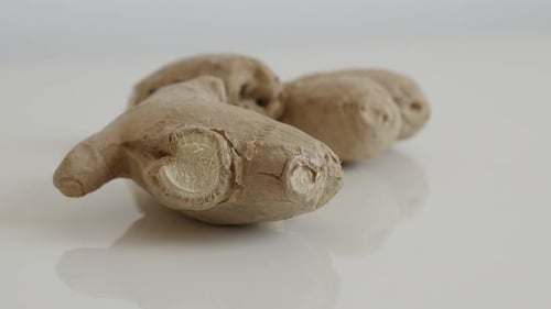 Ginger Roots Close Up on White Background