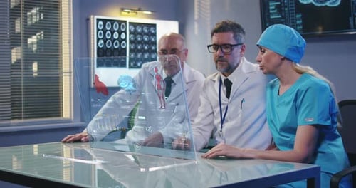 Doctors Analyzing Hologram Data in Futuristic Office