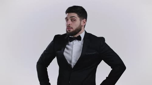 Man in Suit Looking Around Thoughtfully