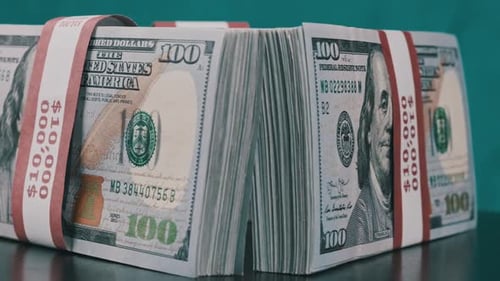 Stacks of Hundred Dollar Bills Rotating Close Up