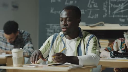 Black Student Asking Question on College Lesson