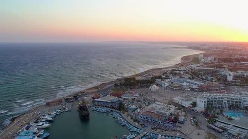 Aerial View of Pier in Summer Seaside City - Cinematic Sunset